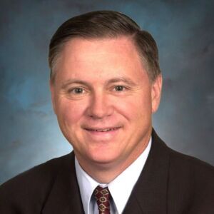 A headshot of Business Hall of Fame inductee Joseph Rigby